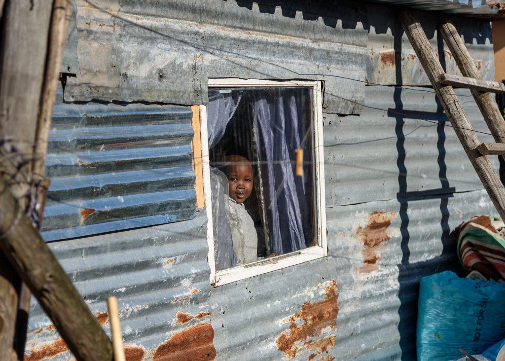 Child living in urban slum