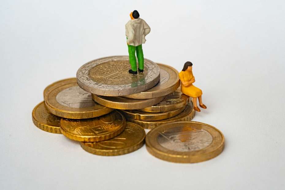 gender inequalities in esg investing - coins, a man and a woman
