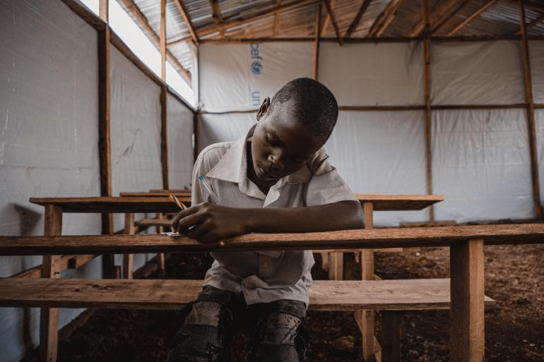 A student in a conflict area in Democratic Republic of the Congo.