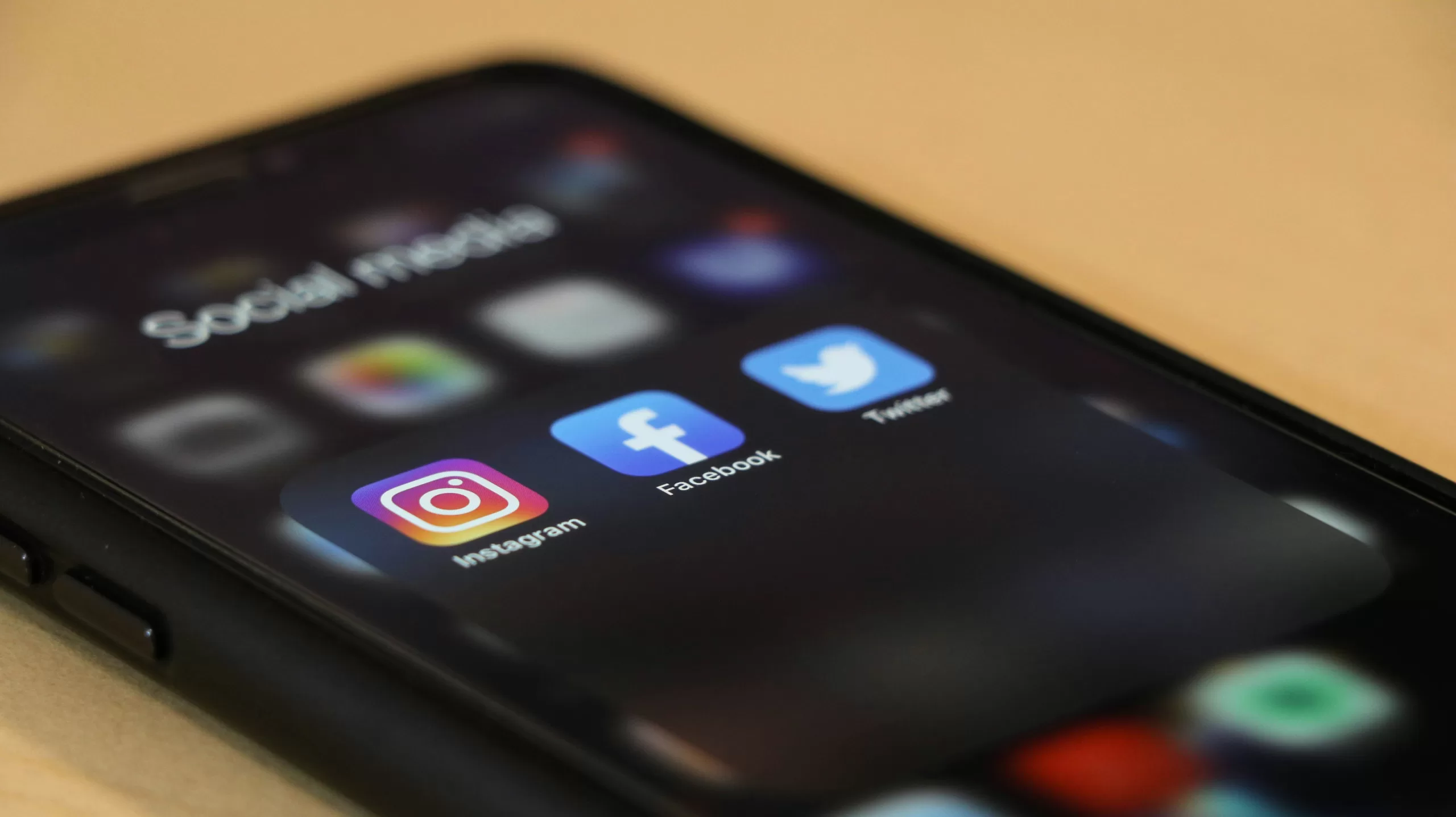 An image of a phone screen with popular social media apps.