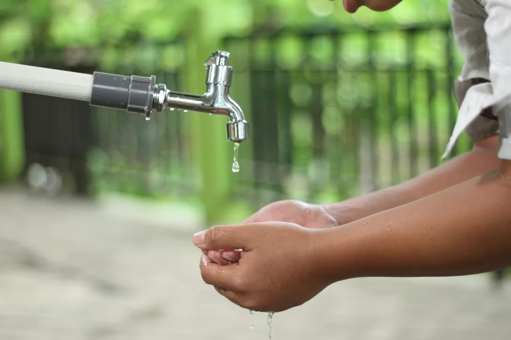 gallery-ds-X_tEarX6svc-unsplash hands catching drip of water